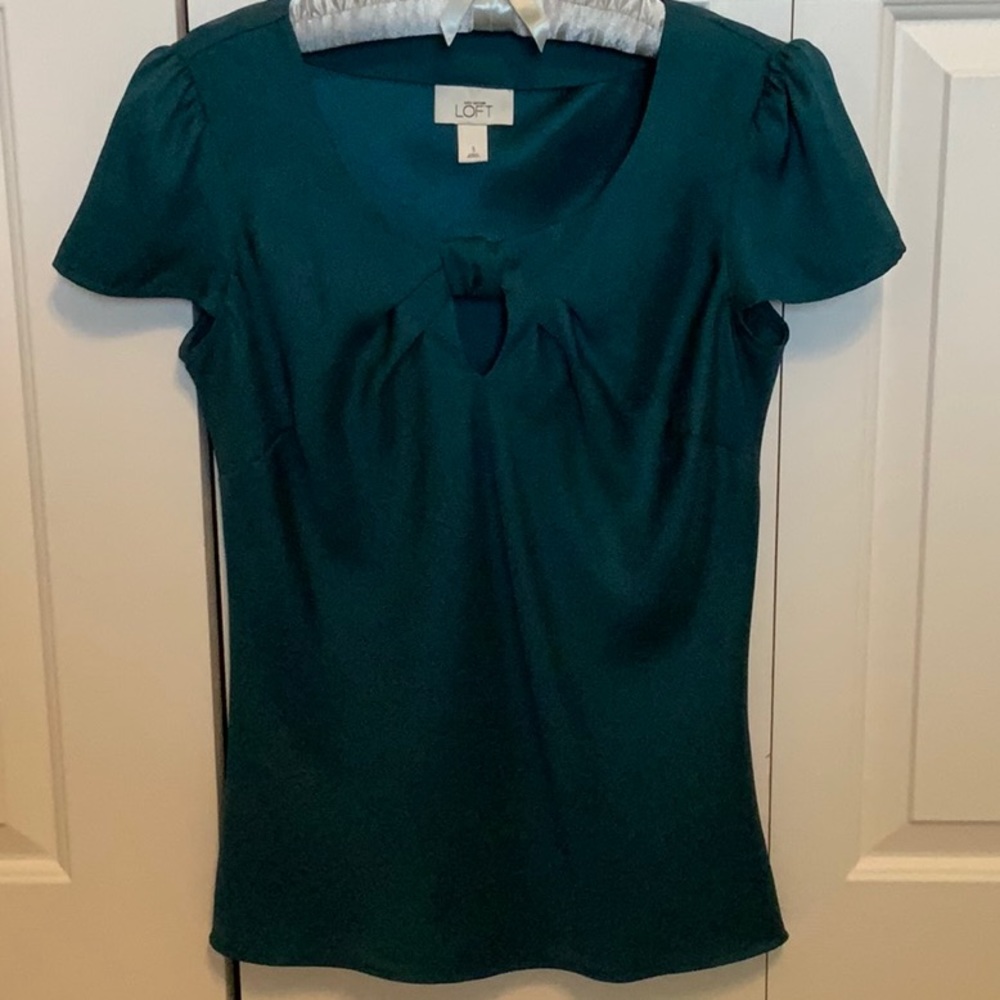 Emerald green blouse with bow front